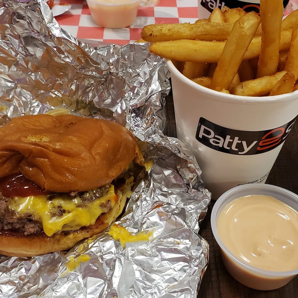 Patty Shack - Cheeseburger with grilled onions, fries and dipping sauce. - Burgers Near Me - Milwaukee, Wisconsin