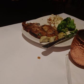 Bonefish Grill - Pecan parmesan crusted trout topped with artichoke hearts, fresh basil & lemon butter,  broccoli & garlic mashed potatoes. - Seafood Near Me - Greensboro, North Carolina