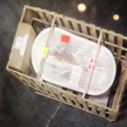 Estes Express Lines - Extra box in with bathtub and hole in plastic where powder fell in. Powder is also on edge of box. Plastic was taped over prior to delivery.