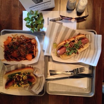 The Vanguard - Duck blt and poutine (left) kilig (right) - Bars Near Me - Milwaukee, Wisconsin