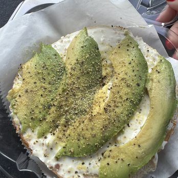 Bagelmania - Sourdough bagel with garlic cream cheese, avocado, and lemon pepper - Coffee & Tea Near Me - Huntington Beach, California