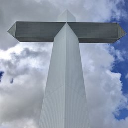The Cross at the Crossroads towers over interstates 57 and 70. The Cross at the Crossroads towers over interstates 57 and 70.