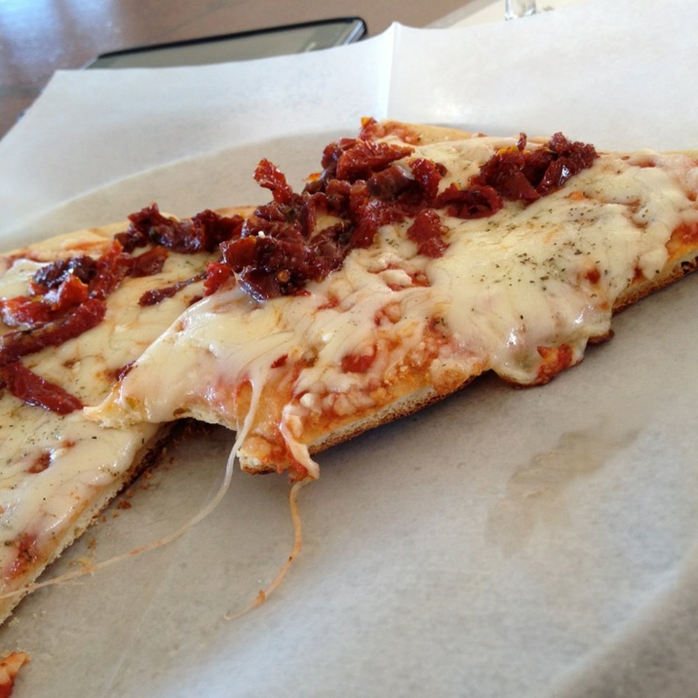 Oak Mountain Winery - Pizza booth in the patio. Three cheese pizza with Sundried tomatoes. - Wineries Near Me - Temecula, California Oak Mountain Winery - Pizza booth in the patio. Three cheese pizza with Sundried tomatoes. - Wineries Near Me - Temecula, California