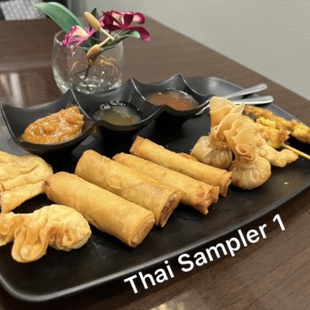 Simply Tasty Thai - Thai Sampler 1 (Spring Rolls, Crab Rangoons, Lumpias, Golden Money Bags, Satays, Curry Puffs) $11 - Seafood Near Me - Jacksonville, Florida Simply Tasty Thai - Thai Sampler 1 (Spring Rolls, Crab Rangoons, Lumpias, Golden Money Bags, Satays, Curry Puffs) $11 - Seafood Near Me - Jacksonville, Florida