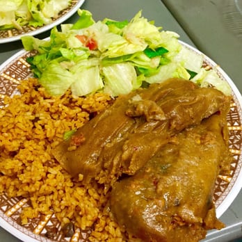 The Pastele Shop - (2) Pasteles (hot) with bacalao salad and rice. yum! - Latin American Near Me - Honolulu, Hawaii The Pastele Shop - (2) Pasteles (hot) with bacalao salad and rice. yum! - Latin American Near Me - Honolulu, Hawaii