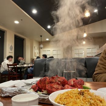 Royal Hyderabad - Check out that steam! You can almost hear the sizzle - Indian Near Me - Albuquerque, New Mexico