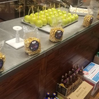 Savannah Candy Kitchen - Making the caramel apples. - Candy Stores Near Me - Fort Washington, Maryland