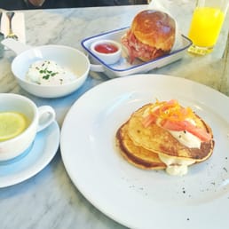 Ricotta pancakes and bacon sandwich