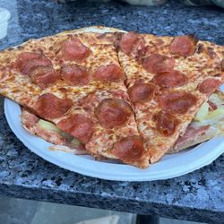 Stefano's Solar Pizza - Pizza slice