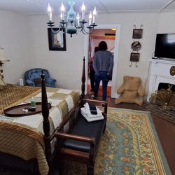 Vaiden Inn - Upstairs 2 bedroom suite - view within first bedroom with wife and Bonnie looking into the 2nd room