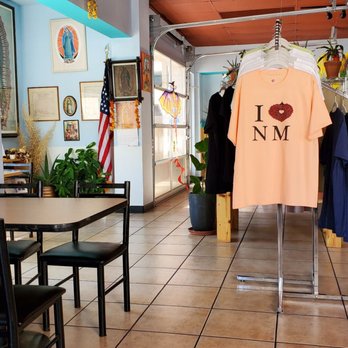 Es Que Market - a t - shirt on a hanger - Sandwiches Near Me - Albuquerque, New Mexico