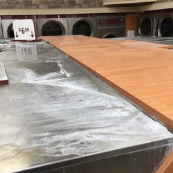 Hudson's Coin Laundry - Don't put your laundry on top of machines
