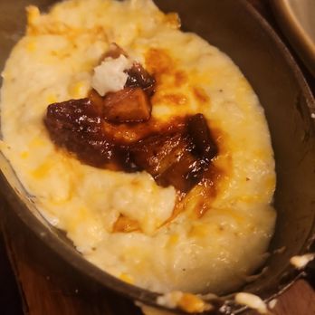 The Iron Cactus - Brisket burnt ends with cheese grits. - Cocktail Bars Near Me - Lancaster, California The Iron Cactus - Brisket burnt ends with cheese grits. - Cocktail Bars Near Me - Lancaster, California