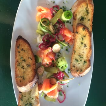 Place Pigalle - House Cured Salmon with Cream Cheese, pickles and olives - French Near Me - Seattle, Washington Place Pigalle - House Cured Salmon with Cream Cheese, pickles and olives - French Near Me - Seattle, Washington