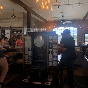 Textile Brewing Company - Original time card clock that is behind the bar - Brewpubs Near Me - Dyersville, Iowa Textile Brewing Company - Original time card clock that is behind the bar - Brewpubs Near Me - Dyersville, Iowa