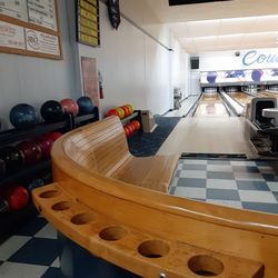 Country Club Lanes - Classic wood seating