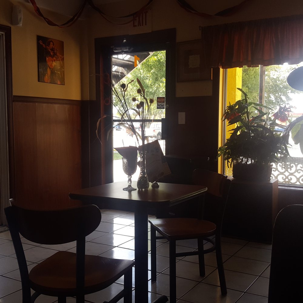 Strawberry Restaurant - Dining room. Nice hole in the wall - Caribbean Near Me - Palm Bay, Florida