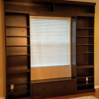Carpentry and Counters - Bookcase cabinet built around window with bench and storage underneath - Carpenters Near Me - Pinellas Park, Florida