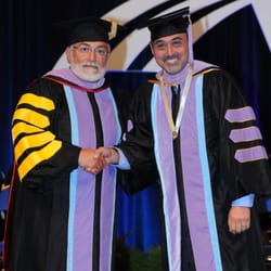 Fatemi Family Dentistry - Dr. Fatemi receiving his Fellowship award from the president of Academy of General Dentistry in San Diego, 2011
