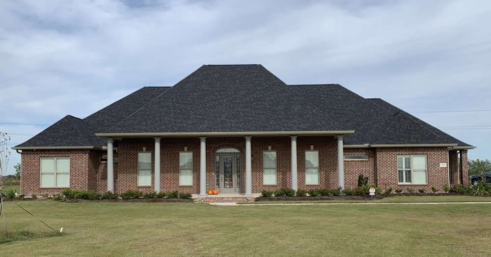 Slide of Hallco Roofing