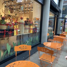 tables and chairs outside a store tables and chairs outside a store