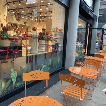 Nuts Factory - tables and chairs outside a store - Specialty Food Near Me - New York, New York Nuts Factory - tables and chairs outside a store - Specialty Food Near Me - New York, New York
