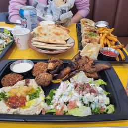 Vegan mix platter and chicken shawarma Arabic on right Vegan mix platter and chicken shawarma Arabic on right