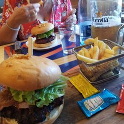 Moline's Grill - Awesome burgers! It's a good relief from the normal Spanish cuisine if you live here. Right next to the train station as well.