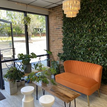 Good Vibes Juice Bar - orange couch and coffee table - Juice Bars & Smoothies Near Me - Easley, South Carolina