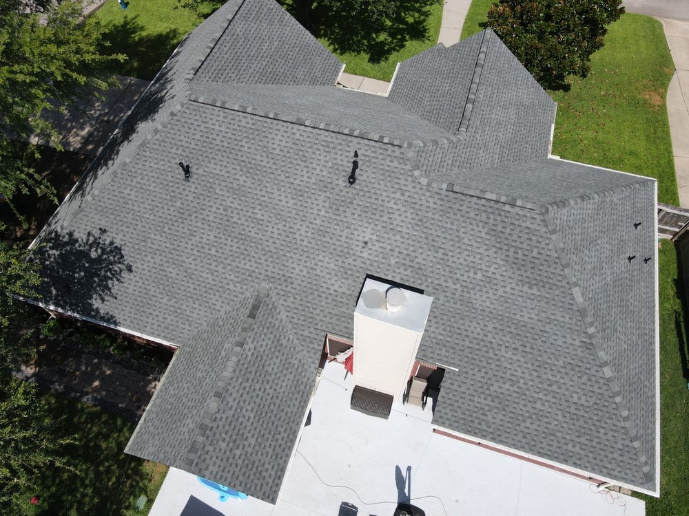 Slide of Core Four Roofing