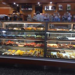 Pastelaria Venus - Boutique de Pão - 1/3rd of the cases holding pastries the delight!!! Great wooden paneling, granite floors; a locals' place. Mmmm...