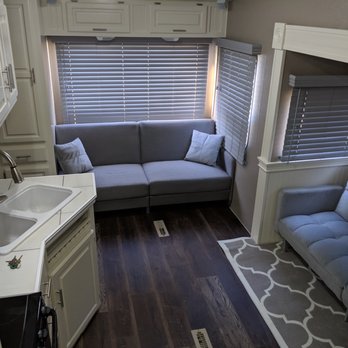 One up construction - a living room and kitchen - General Contractors Near Me