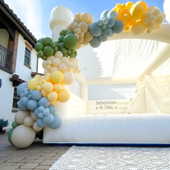 She’s Crafty Balloon - Bouncer with balloon garland - Balloon Services Near Me She’s Crafty Balloon - Bouncer with balloon garland - Balloon Services Near Me