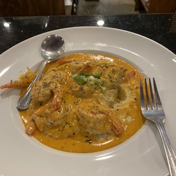 The Omega Grill - Shrimp and grits. Normally comes with sausage but I requested no pork/beef. - American Near Me - Spring, Texas The Omega Grill - Shrimp and grits. Normally comes with sausage but I requested no pork/beef. - American Near Me - Spring, Texas
