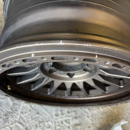 Damaged wheel by incompetent workers. Damaged wheel by incompetent workers.