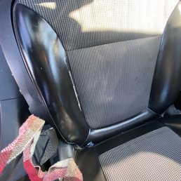 Huge tear in my driver's side seat. This was NOT like this when I brought it in