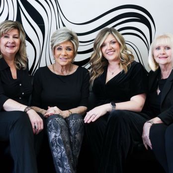 The Big Wigs - Meet our Team  From left to right : Therese - Wig Stylist Sandy - Owner Brandi - Manager Cheryl - Stylist - Cosmetics & Beauty Supply Near Me - Orange, California