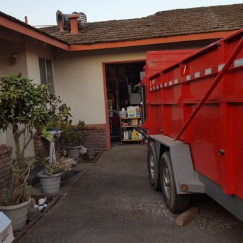 Armor Roofing - Dump bin full of old wood shingles - Roofing Near Me - Modesto, California