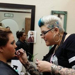 Kingwood Salon & Spa - Stylist Melissa doing makeup on a client