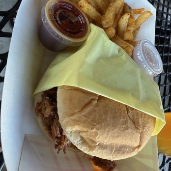 The Landing - Pulled pork sandwich with bbq sauce on the side which we didn't ask for. Sandwich was good, not great. Fries were good. - Barbeque Near Me - Bend, Oregon The Landing - Pulled pork sandwich with bbq sauce on the side which we didn't ask for. Sandwich was good, not great. Fries were good. - Barbeque Near Me - Bend, Oregon