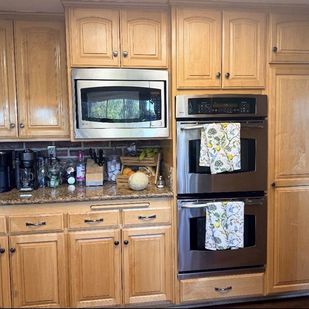 Nice and Clean Painting - Before picture of the pantry and oven section - Painters Near Me