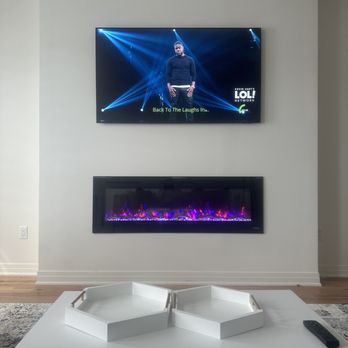 Tri Amp Contracting Services - Custom Electric Fireplace & inserted TV wall mount - General Contractors Near Me Tri Amp Contracting Services - Custom Electric Fireplace & inserted TV wall mount - General Contractors Near Me