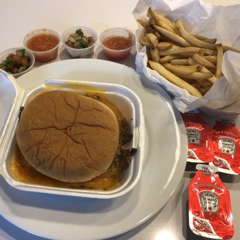 Chris Madrid's - Tostada Burger to go- with refried beans, tortilla chips, onions, melted cheese with generous order of fries& salsas-awesome! - Burgers Near Me - San Antonio, Texas Chris Madrid's - Tostada Burger to go- with refried beans, tortilla chips, onions, melted cheese with generous order of fries& salsas-awesome! - Burgers Near Me - San Antonio, Texas