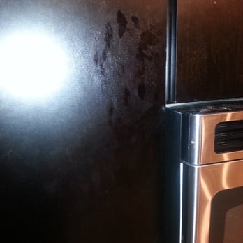 Spotless Cleaning Service - Handprints on the cupboards - Home Cleaning Near Me - Dallas, Texas Spotless Cleaning Service - Handprints on the cupboards - Home Cleaning Near Me - Dallas, Texas
