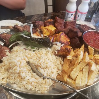 Golden Fork - a plate of food on a table - Armenian Near Me - Van Nuys, California Golden Fork - a plate of food on a table - Armenian Near Me - Van Nuys, California