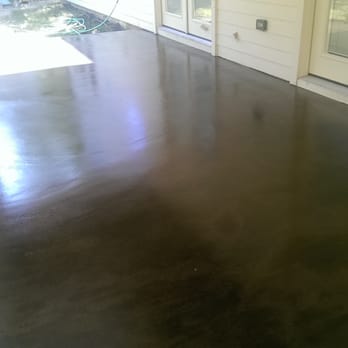Contreras Decorative Concrete - overlay, acid black/brown acid stain. this was an ugly broom finished concrete previously. - Flooring Near Me