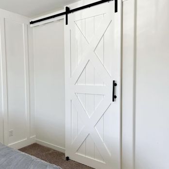 MD Renovations & Construction - a sliding door in a bedroom - General Contractors Near Me MD Renovations & Construction - a sliding door in a bedroom - General Contractors Near Me