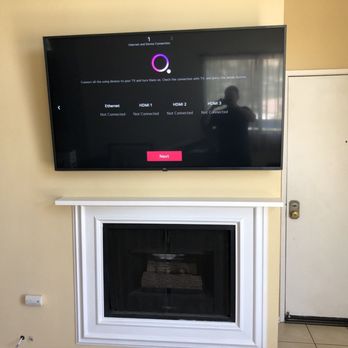 Big Ben Mounts - 65' TV mounted above fireplace with no cables - Electricians Near Me - Tarzana, California