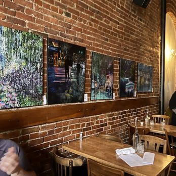 Damn the Weather - Wall with local artist work for sale - Cocktail Bars Near Me - Seattle, Washington Damn the Weather - Wall with local artist work for sale - Cocktail Bars Near Me - Seattle, Washington