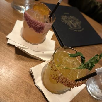 Earls Kitchen + Bar - Strawberry Smokeshow Margarita--- left side  Passion Fruit Chili Margarita--- right side - Cocktail Bars Near Me - Plano, Texas